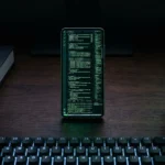 Code editor with syntax highlighted code on Android phone screen at night